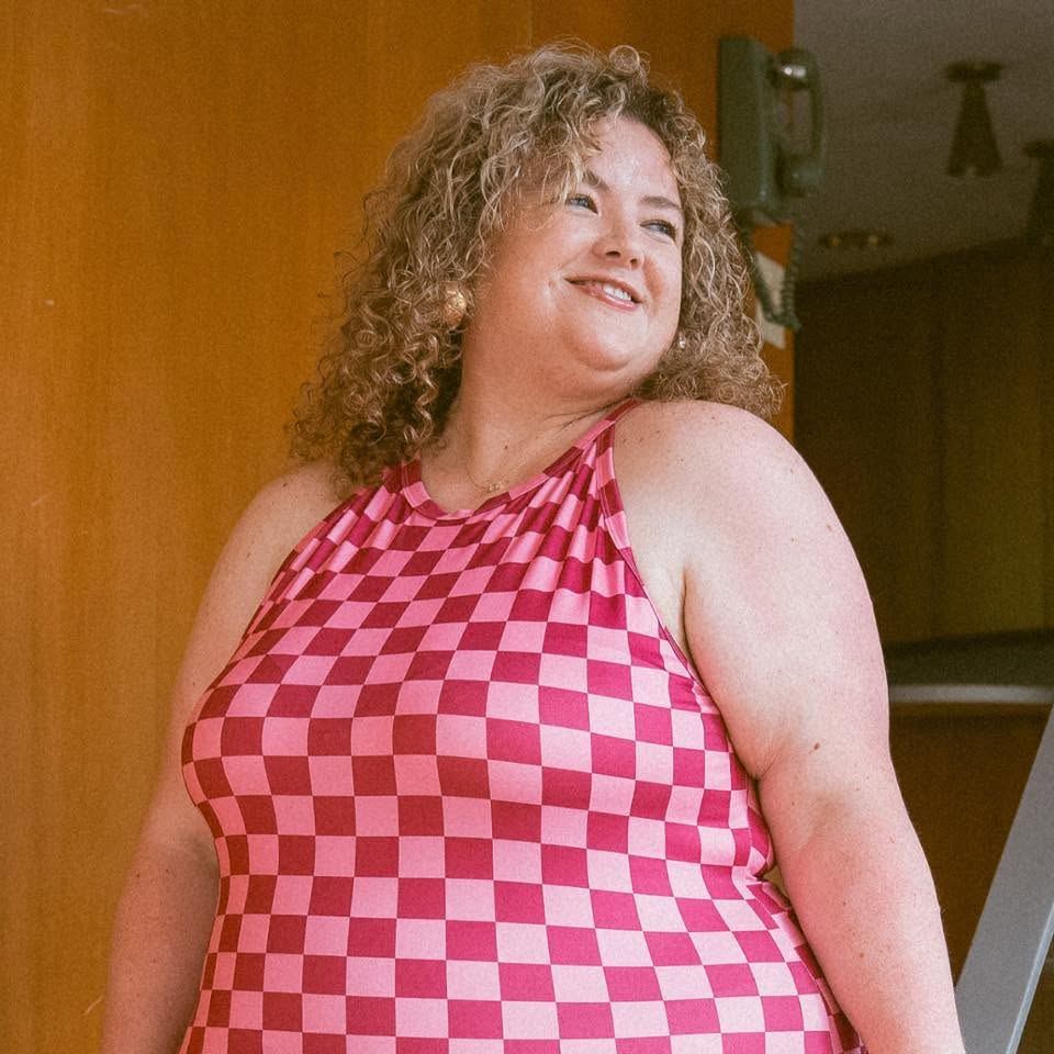Jessica in a pink checkered dress