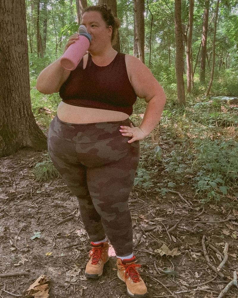 Jessica on a forest trail in hiking boots